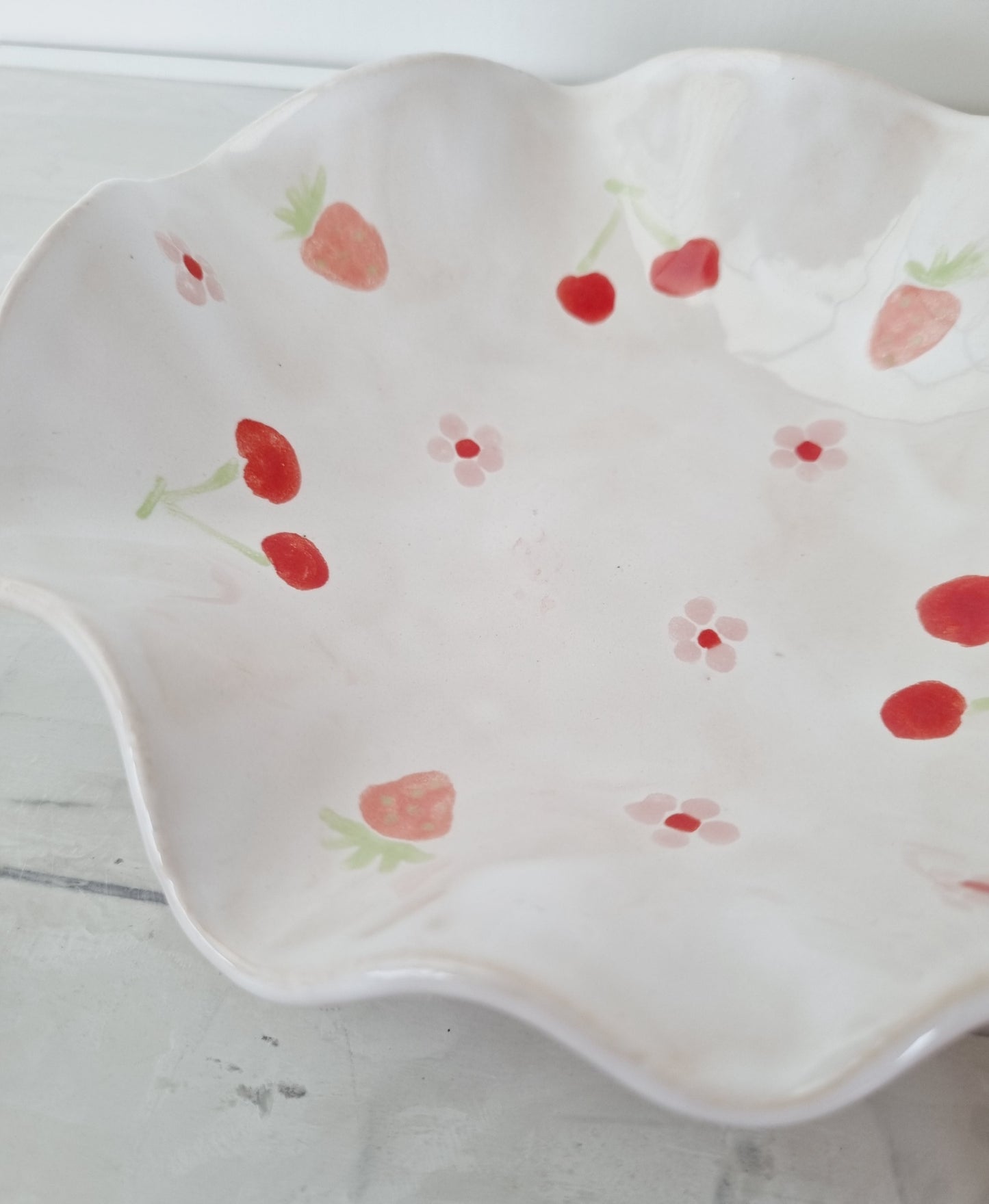 Handmade wavy bowl, handpainted with strawberries, cherries and daisies. For ice cream, fruit or snacks