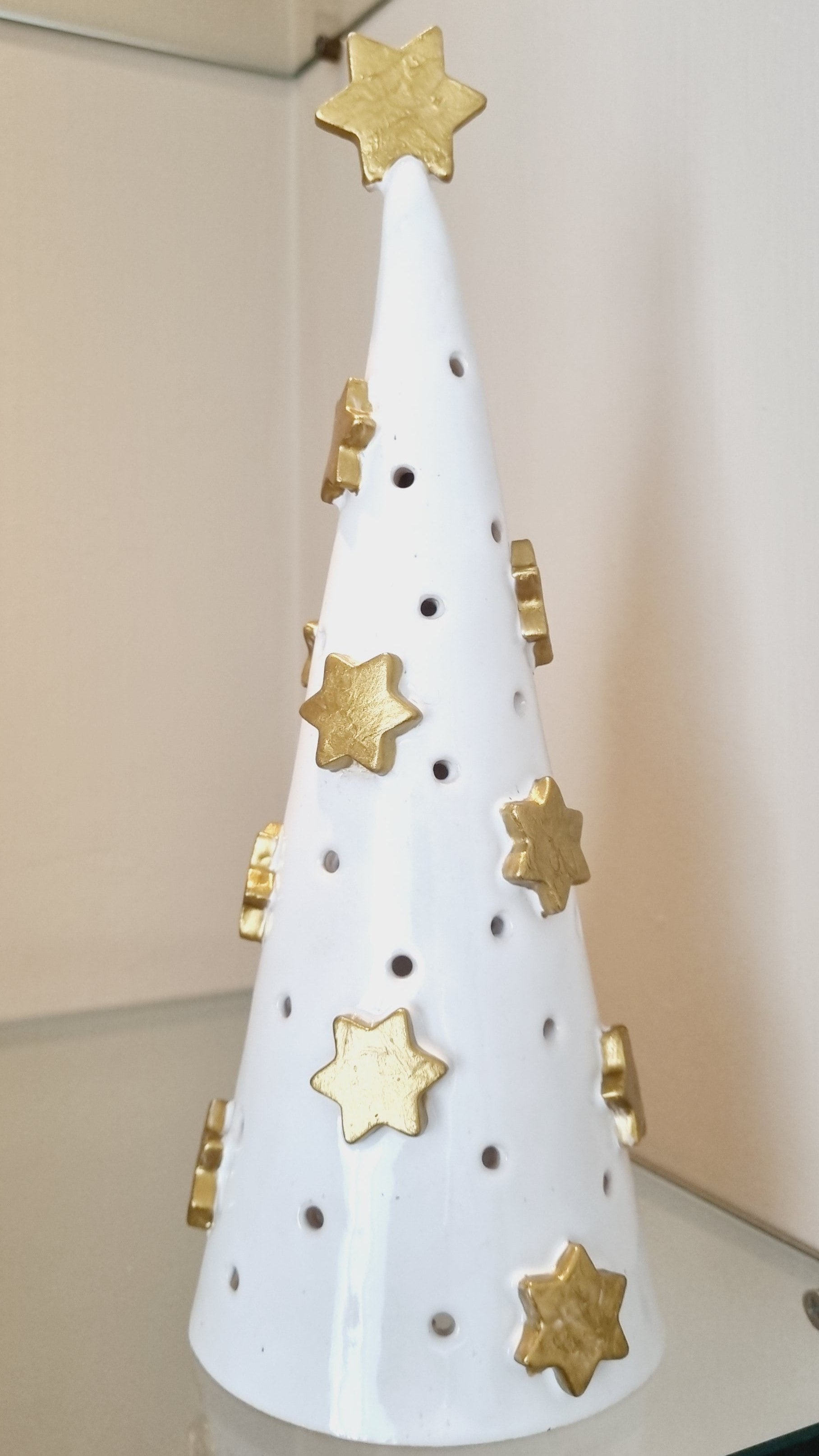 White ceramic tree with golden stars
