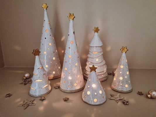 Light up your home with Handmade ceramic Christmas trees. History and benefitstory