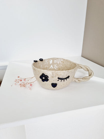 Hand made mug with wink