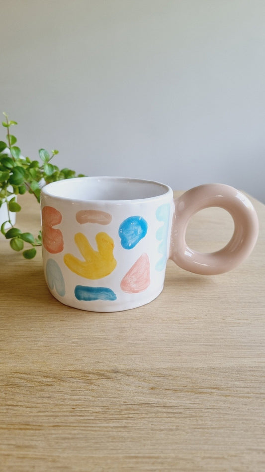 Modern colorful mug, handpainted with vectors geometric graphics, unique donut handle. Handmade gift for artistic person.