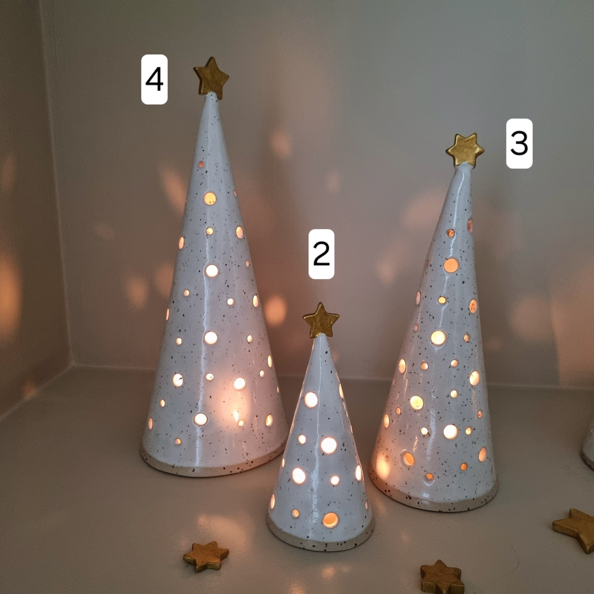 White ceramic Christmas trees, pierced Christmas luminary, made from speckled clay