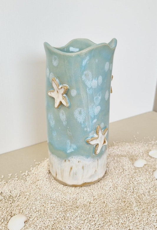 Whimsical handmade coastal style vase. Teal with sand color starfish. 