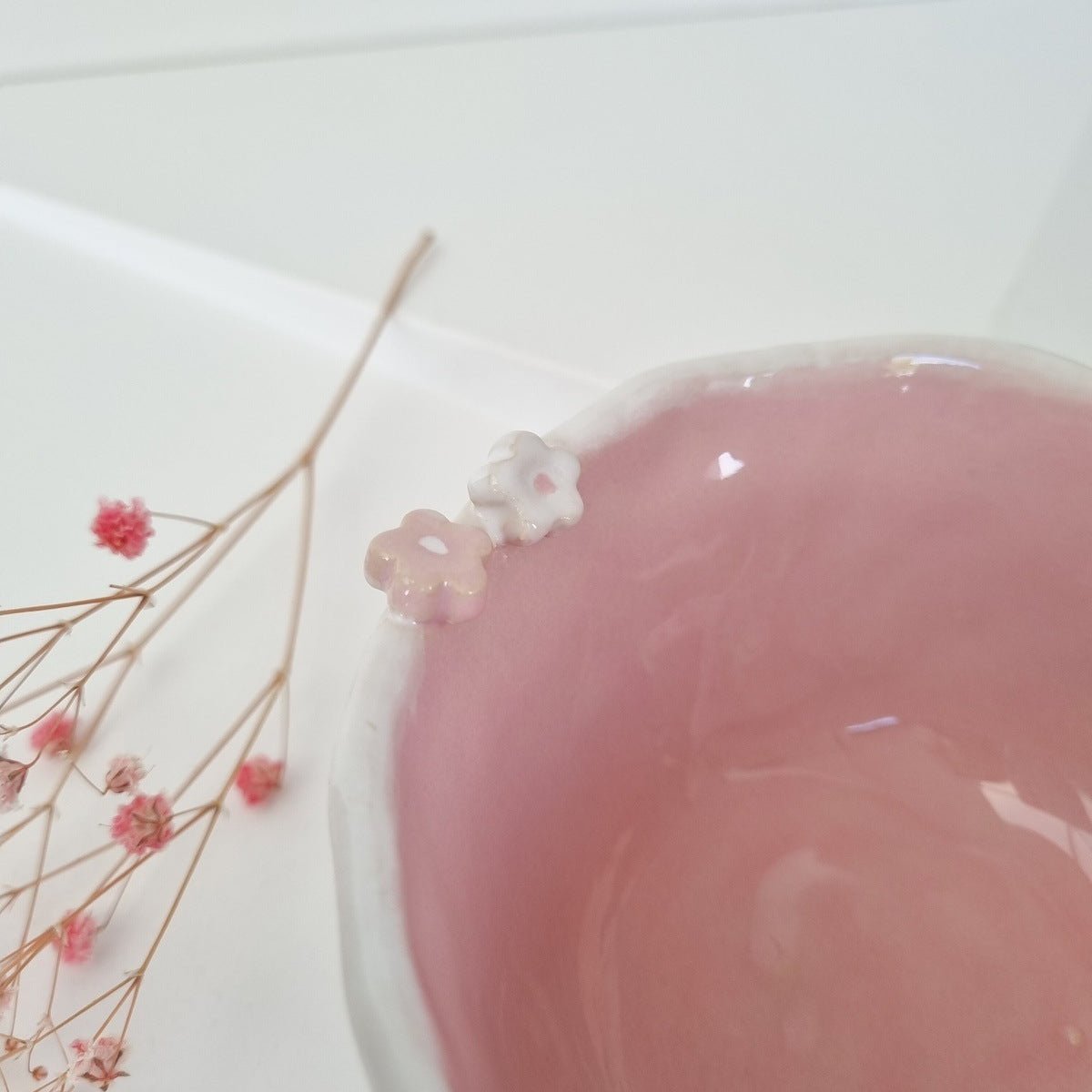 Handmade wide mug with flowersCeramic daisies on the rim of the mug