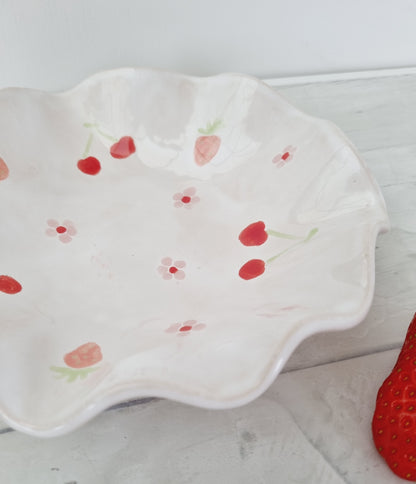 Handmade ruffle bowl handpainted with daisies, strawberries and cherries