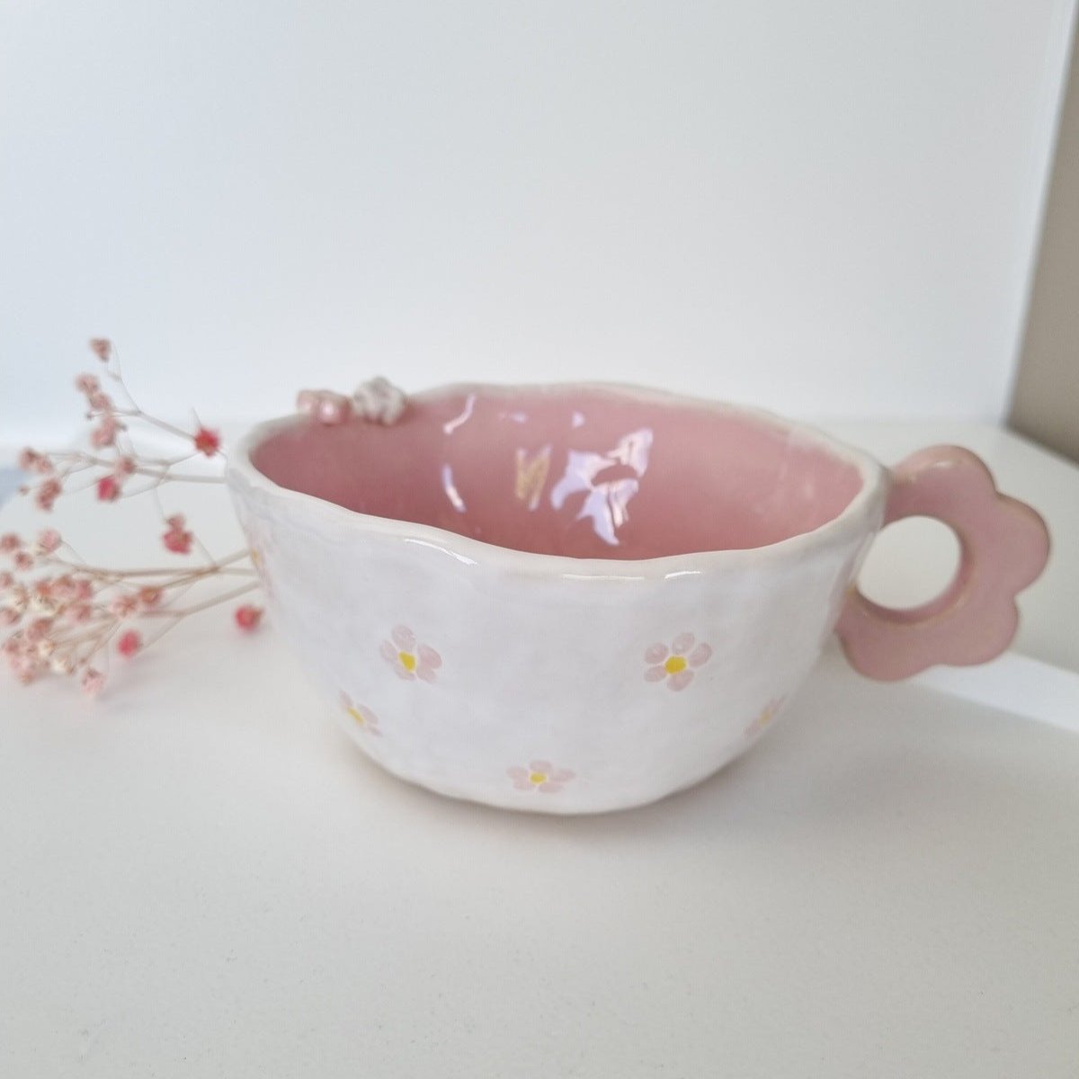 Handmade hand shaped whimsical romantic mug hand painted with daisies pink and white