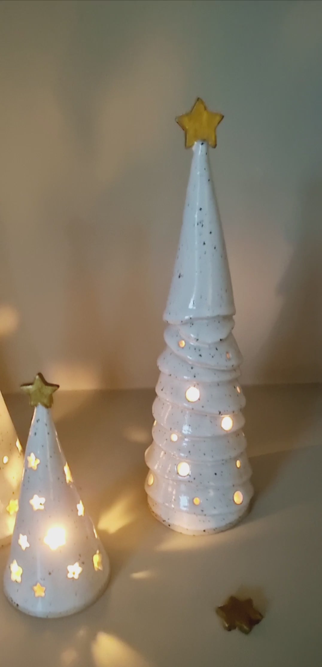 Group ceramic Christmas trees. Pierced Holiday decor for small spaces.