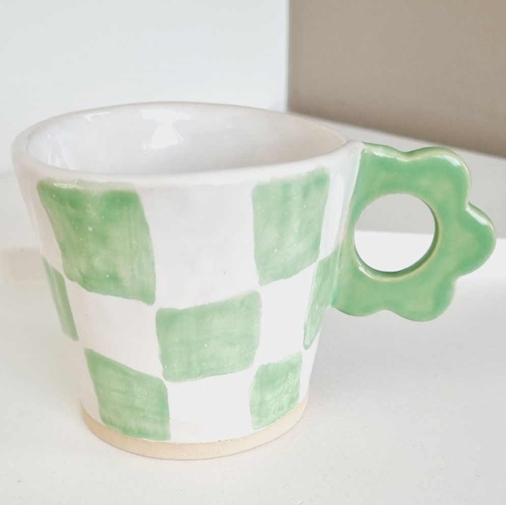 Small spresso or teacup. Handmade and handpainted with green checkers pattern. Unique flower shape handle