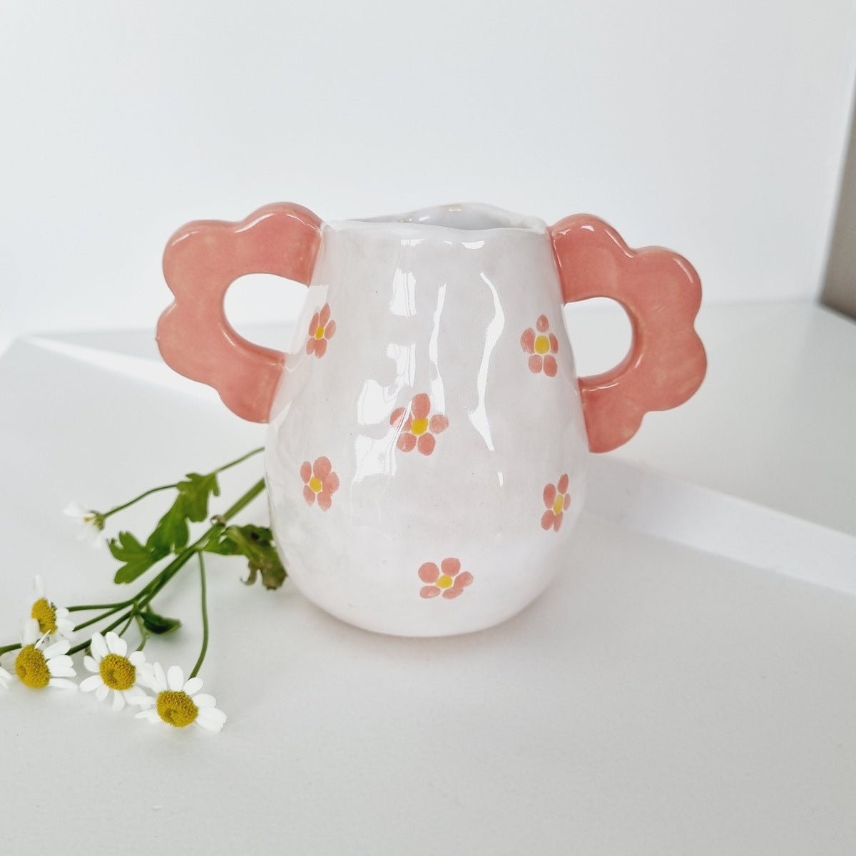 Small vase handpainted with daisies